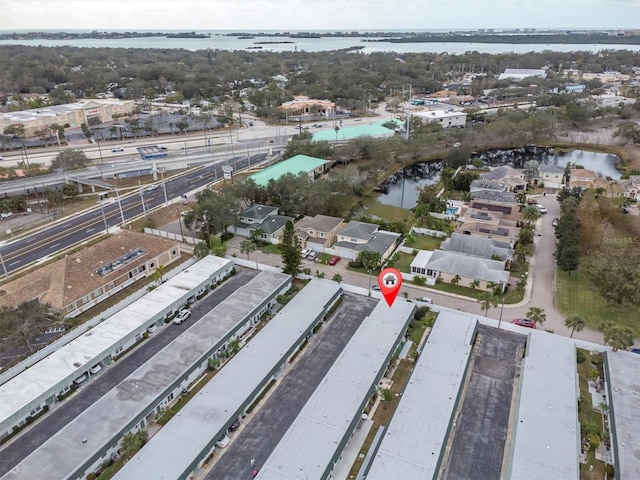 birds eye view of property featuring a water view