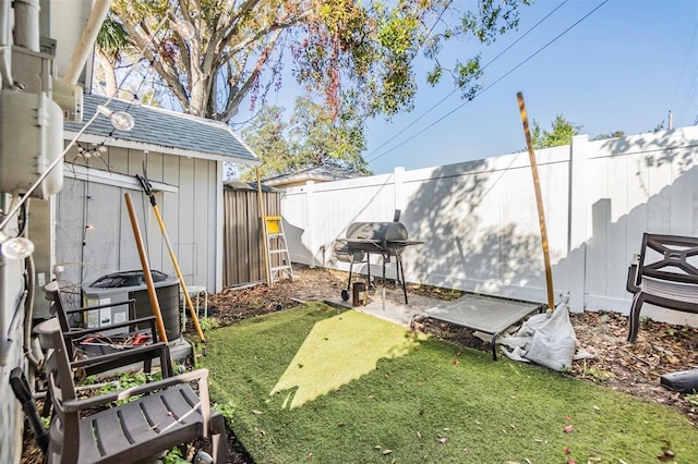 view of yard with central AC