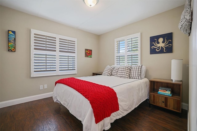 bedroom featuring dark hardwood / wood-style floors