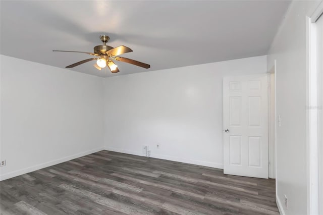 unfurnished room with ceiling fan and dark hardwood / wood-style floors