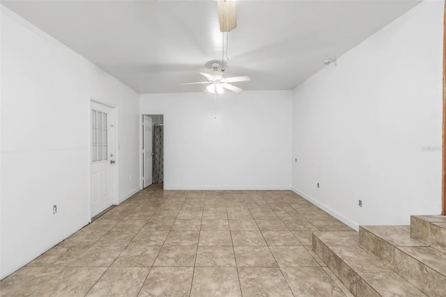 unfurnished room featuring ceiling fan and light tile patterned floors