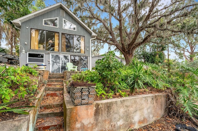 contemporary home with an outbuilding