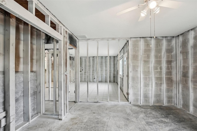 interior space featuring ceiling fan