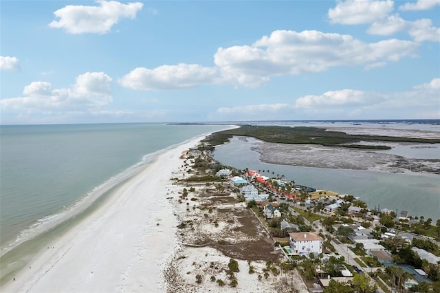 bird's eye view with a water view and a view of the beach