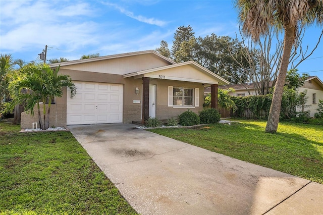 single story home with a front lawn and a garage