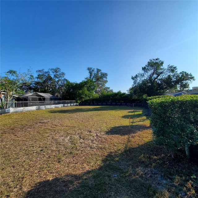 view of yard featuring fence