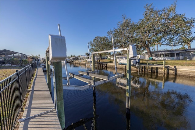 dock area with a water view