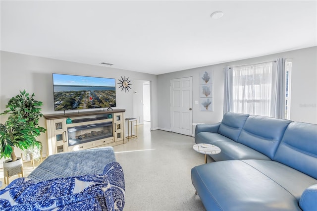 living room with a healthy amount of sunlight