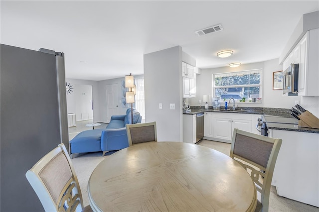 dining area with sink