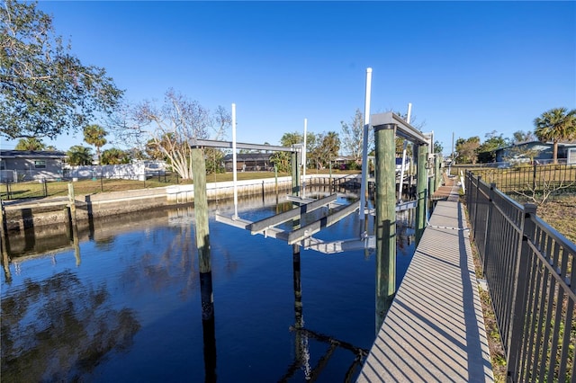 dock area with a water view