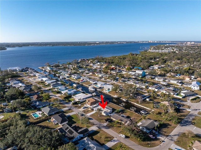 birds eye view of property featuring a water view