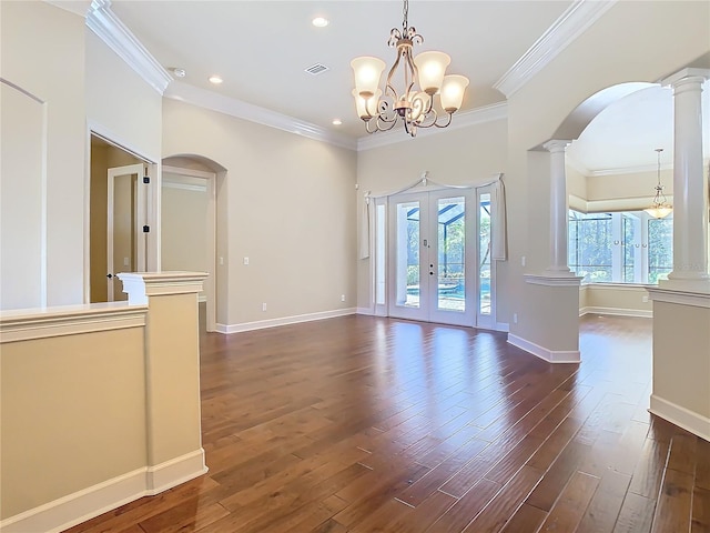 unfurnished room with dark wood-style flooring, french doors, baseboards, and ornate columns