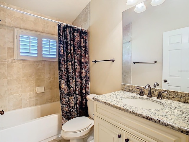 full bathroom with shower / bath combo, vanity, and toilet