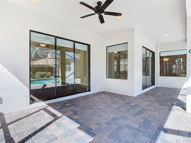 view of patio / terrace featuring a ceiling fan