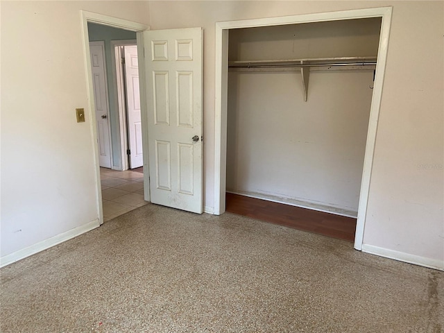 unfurnished bedroom with a closet