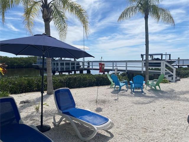 view of patio / terrace with a water view