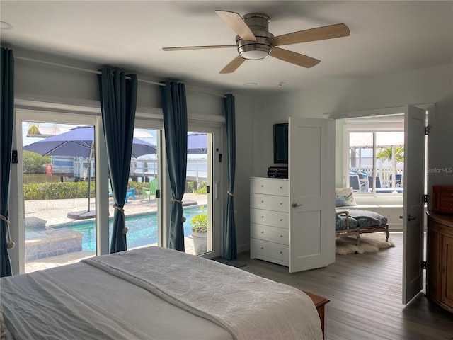 bedroom with ceiling fan, hardwood / wood-style floors, and access to exterior