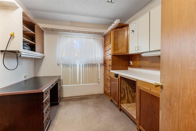 kitchen with a textured ceiling