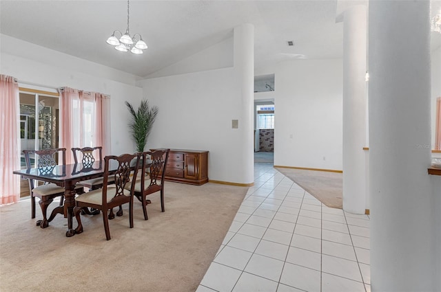 carpeted dining area featuring lofted ceiling, a wealth of natural light, and an inviting chandelier