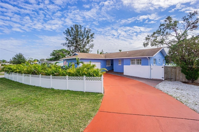 ranch-style home with a front yard