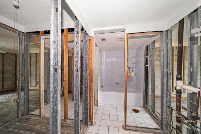 bathroom with a textured ceiling