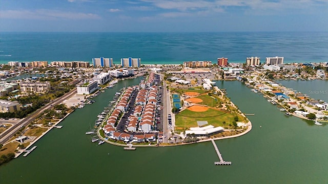 birds eye view of property featuring a water view