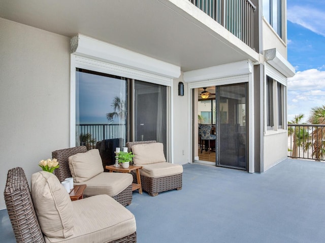 view of patio featuring a balcony