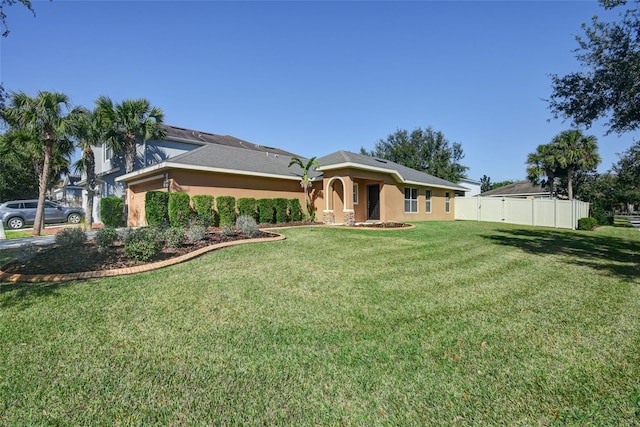 view of front of home featuring a front yard