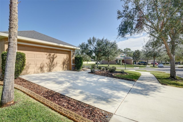 view of patio / terrace featuring a garage