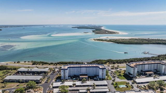 bird's eye view featuring a water view and a city view