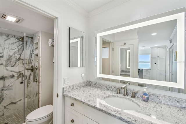 full bathroom featuring toilet, visible vents, crown molding, and a marble finish shower