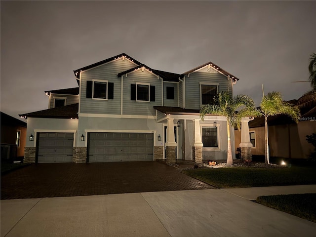 view of front of home with a garage