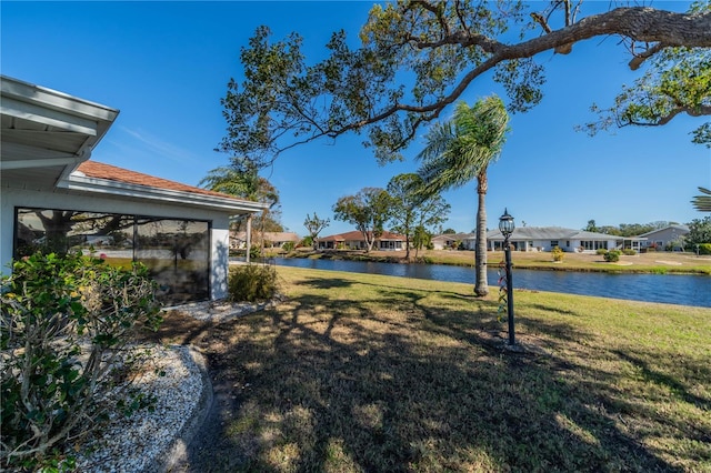 view of yard with a water view