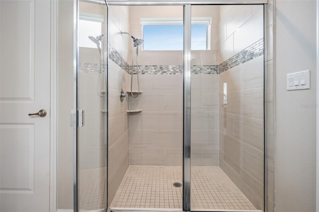 bathroom featuring walk in shower