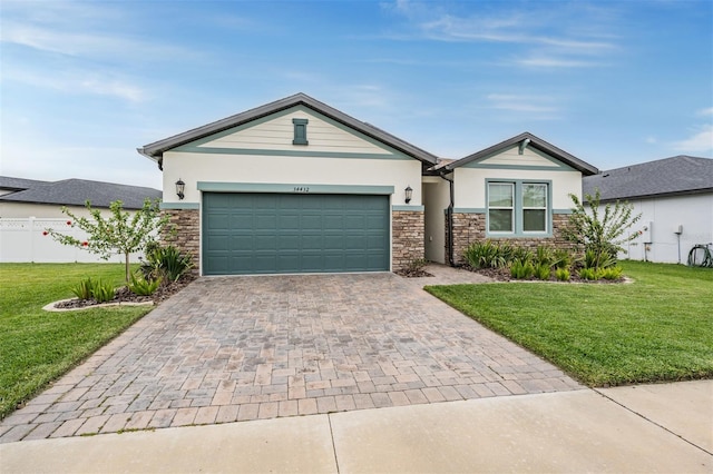 ranch-style house with a front lawn and a garage