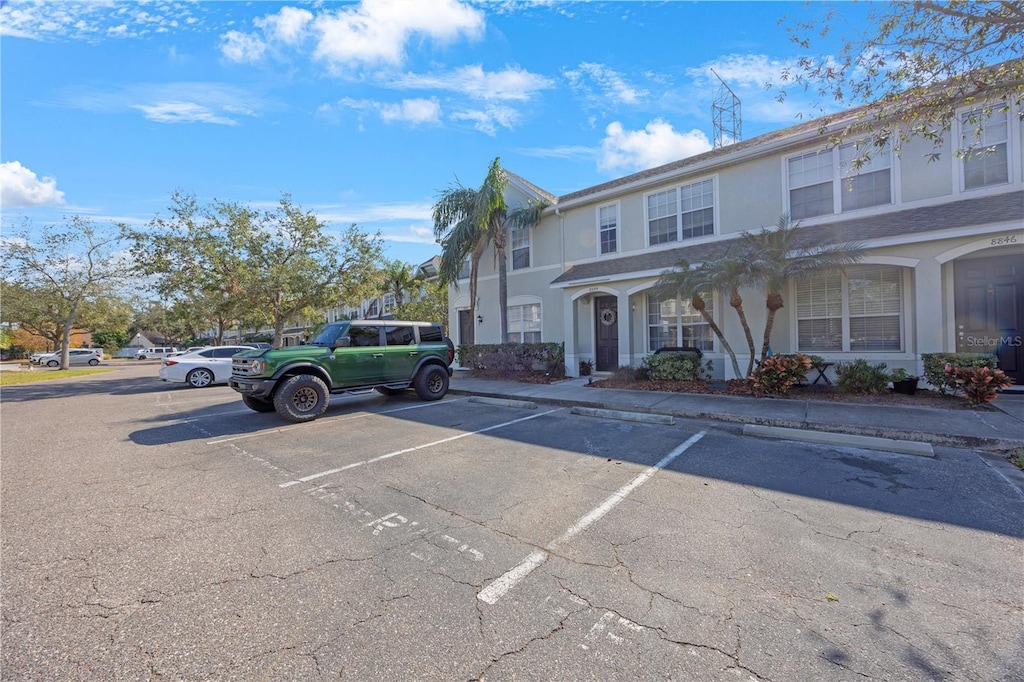 view of parking / parking lot