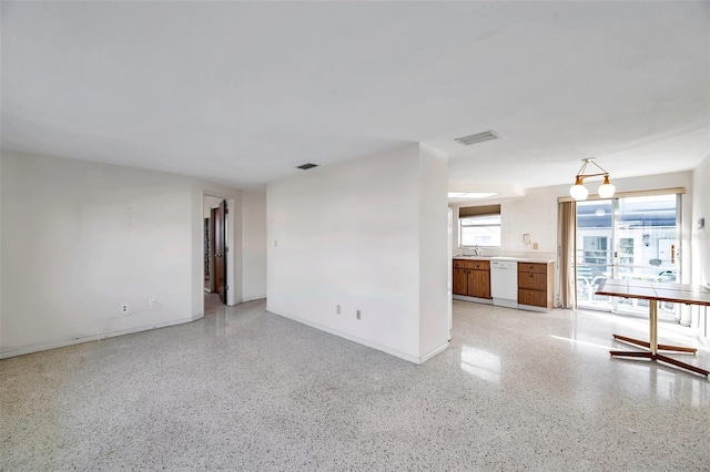 unfurnished room with sink