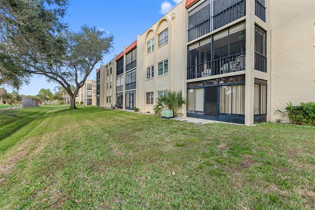 view of building exterior featuring central AC unit