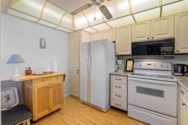 kitchen with white appliances, ceiling fan, and light hardwood / wood-style flooring