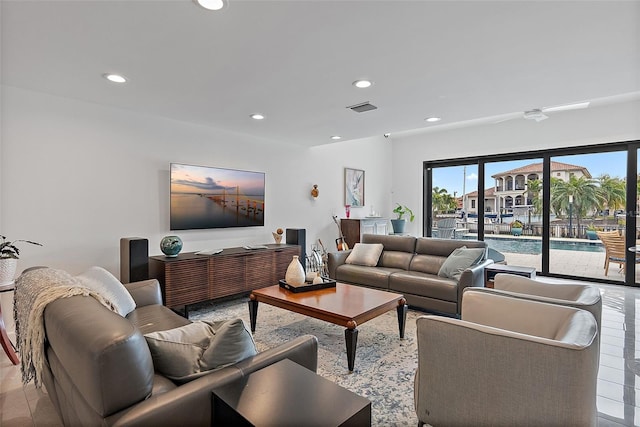 living room with ceiling fan