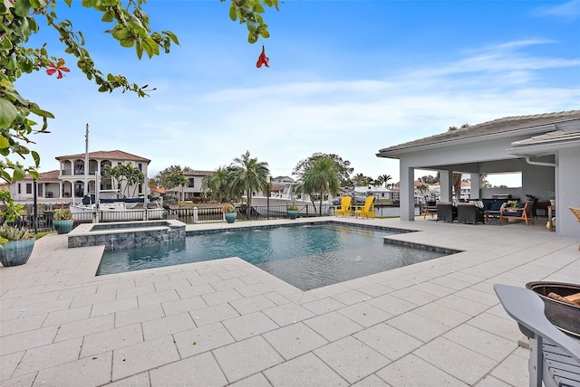 view of swimming pool featuring a patio area, a gazebo, and an in ground hot tub