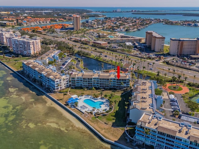 birds eye view of property with a water view