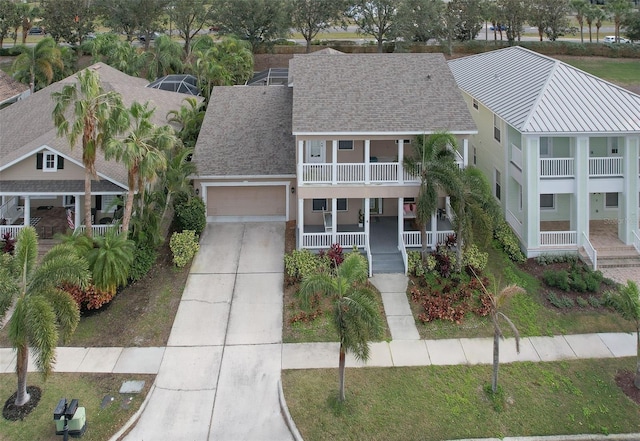 view of front of property with a porch and a balcony