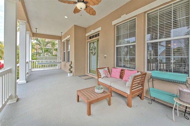 view of patio / terrace featuring ceiling fan and covered porch