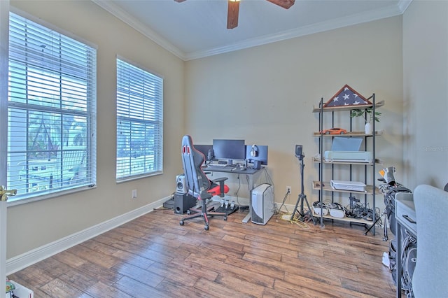 office space featuring hardwood / wood-style flooring, ornamental molding, and ceiling fan