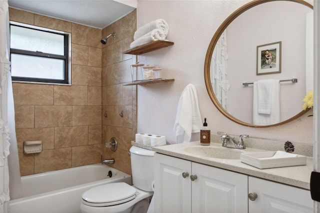 full bathroom with shower / tub combo, vanity, and toilet