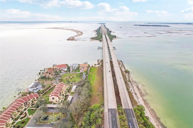 aerial view featuring a water view and a view of the beach