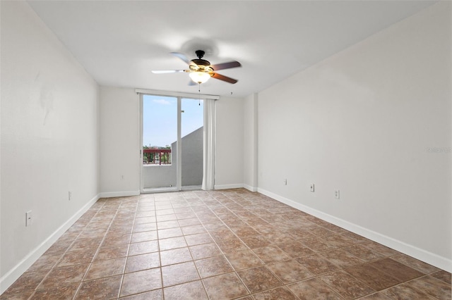 spare room featuring ceiling fan