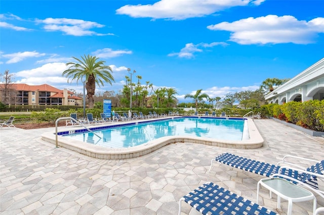 view of swimming pool featuring a patio