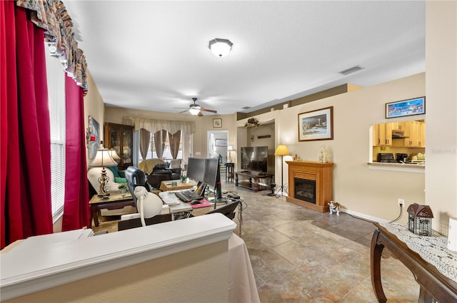 living room featuring ceiling fan